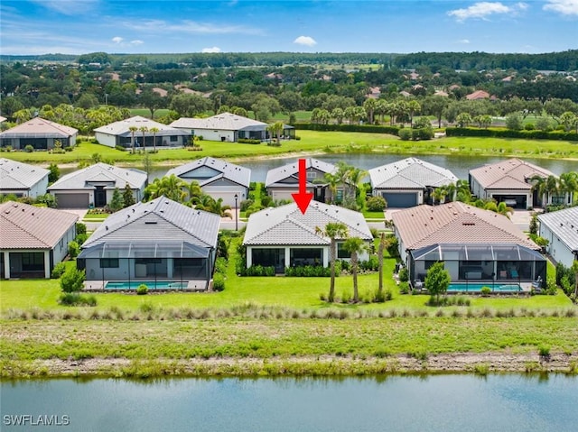 5596 Celebration Dr, Ave Maria, FL 34142 - aerial view of residential area featuring a nearby body of water
