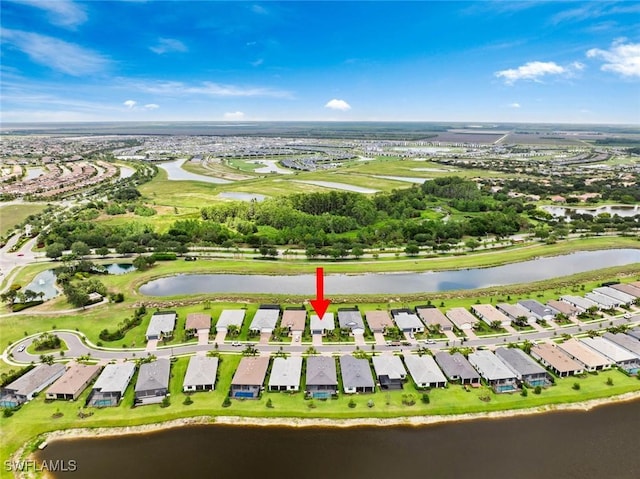 5596 Celebration Dr, Ave Maria, FL 34142 - aerial overview of property's location featuring a nearby body of water and nearby suburban area
