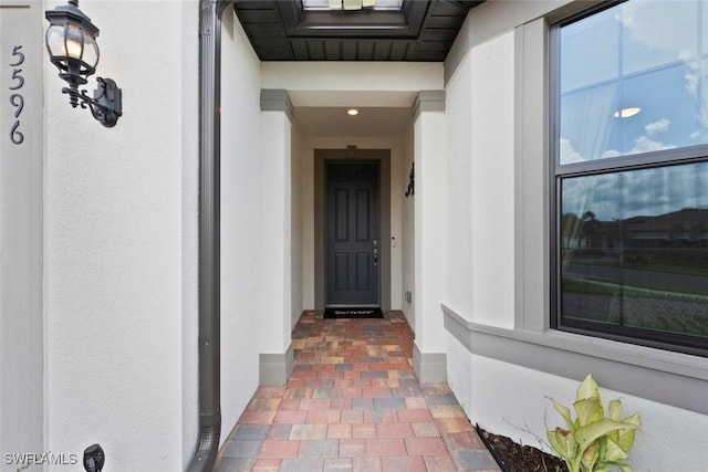 5596 Celebration Dr, Ave Maria, FL 34142 - view of exterior entry with stucco siding