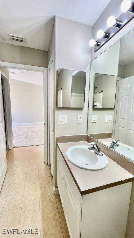 4532/4534 29th St SW, Lehigh Acres, FL 33973 - bathroom featuring vanity