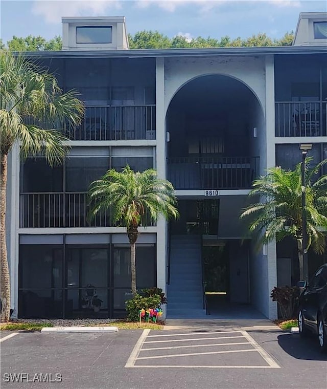 9610 Green Cypress Ln Unit 4, Fort Myers, FL 33905 - view of property with uncovered parking