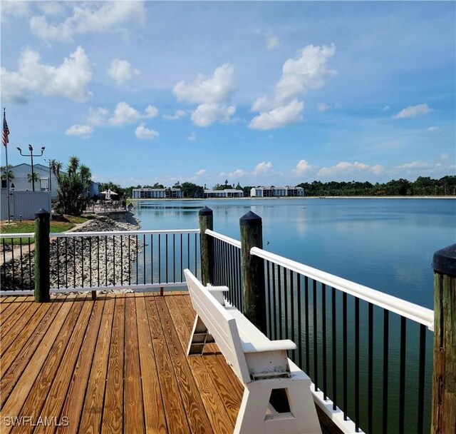 9610 Green Cypress Ln Unit 4, Fort Myers, FL 33905 - dock area with a water view and a balcony
