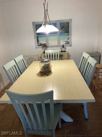 9610 Green Cypress Ln Unit 4, Fort Myers, FL 33905 - dining room with dark tile patterned floors