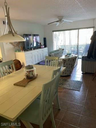 9610 Green Cypress Ln Unit 4, Fort Myers, FL 33905 - dining space with a ceiling fan