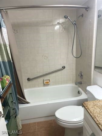 9610 Green Cypress Ln Unit 4, Fort Myers, FL 33905 - full bathroom with shower / bath combination with curtain, vanity, toilet, and tile patterned floors