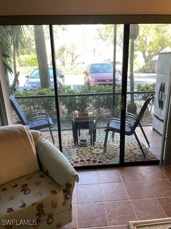 9610 Green Cypress Ln Unit 4, Fort Myers, FL 33905 - sunroom / solarium featuring plenty of natural light