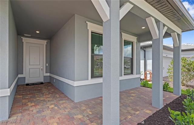 6600 Legacy Way, Ave Maria, FL 34142 - property entrance featuring stucco siding