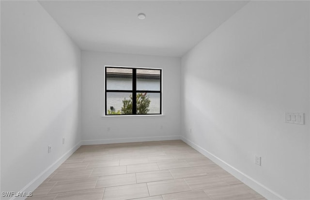 6600 Legacy Way, Ave Maria, FL 34142 - unfurnished room featuring baseboards