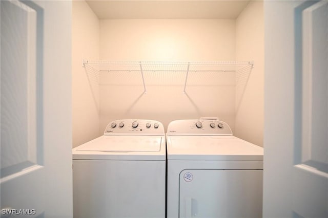 130 Sanborn Dr, Lehigh Acres, FL 33972 - washroom with independent washer and dryer
