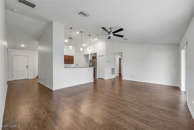1205 SW 32nd Ter, Cape Coral, FL 33914 - unfurnished living room featuring ceiling fan, high vaulted ceiling, baseboards, and dark wood-type flooring