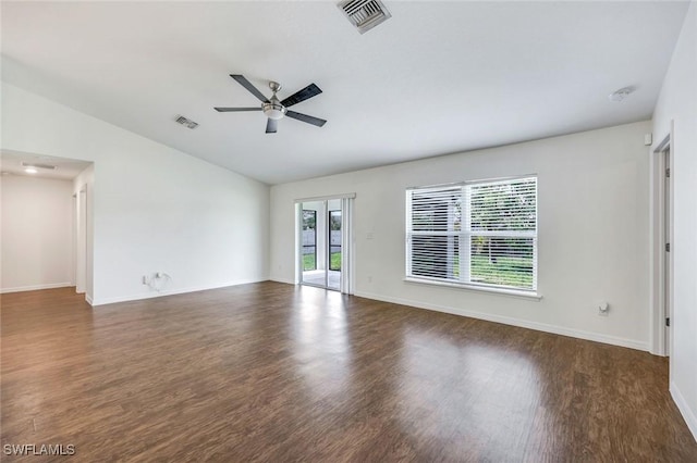 1205 SW 32nd Ter, Cape Coral, FL 33914 - unfurnished room featuring vaulted ceiling, ceiling fan, wood finished floors, baseboards, and a smoke detector