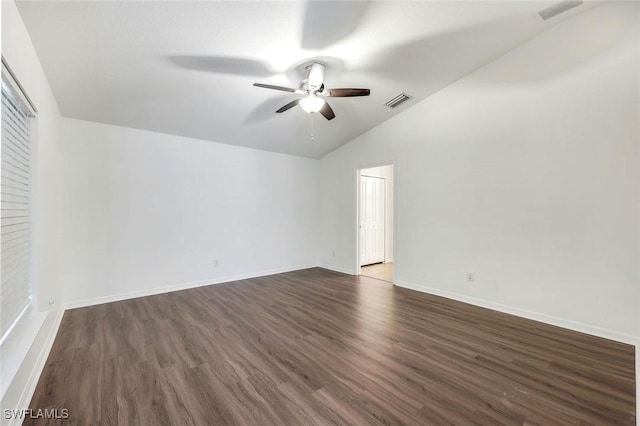 1205 SW 32nd Ter, Cape Coral, FL 33914 - unfurnished room featuring vaulted ceiling, ceiling fan, dark wood finished floors, and baseboards