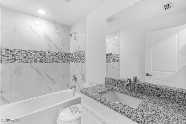 955 Plantation Rd, Lehigh Acres, FL 33974 - full bathroom featuring toilet, vanity, shower / tub combination, and recessed lighting