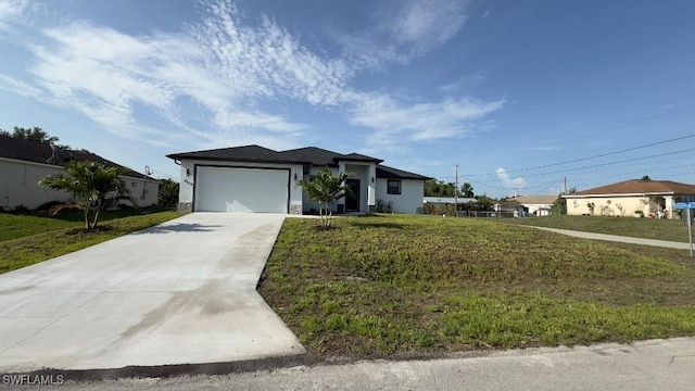 4619 7th St W, Lehigh Acres, FL 33971 - view of front of property with an attached garage, driveway, and a front yard