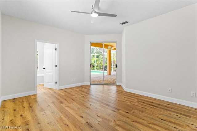 3519 Heron Cove Ct, Bonita Springs, FL 34134 - unfurnished room with ceiling fan, light wood-style flooring, and baseboards