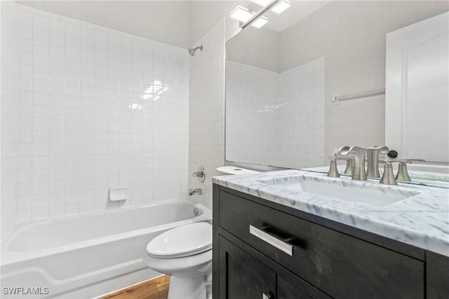 3519 Heron Cove Ct, Bonita Springs, FL 34134 - bathroom with toilet, vanity, shower / bathtub combination, and wood finished floors