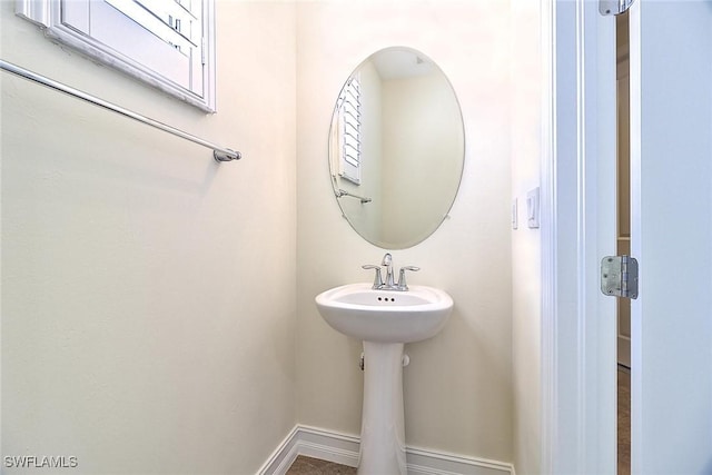 9440 Sardinia Way Unit 110, Fort Myers, FL 33908 - bathroom featuring baseboards