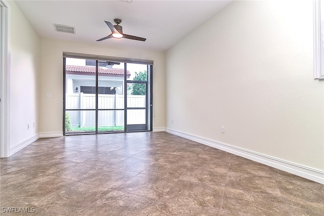 9440 Sardinia Way Unit 110, Fort Myers, FL 33908 - spare room featuring baseboards and a ceiling fan