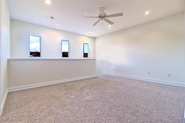 9440 Sardinia Way Unit 110, Fort Myers, FL 33908 - empty room with a ceiling fan, carpet floors, recessed lighting, baseboards, and a smoke detector