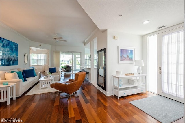 4610 Hawks Nest Dr Unit A104, Naples, FL 34114 - living room featuring wood finished floors, crown molding, baseboards, and ceiling fan