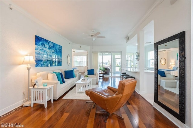 4610 Hawks Nest Dr Unit A104, Naples, FL 34114 - living room featuring ornamental molding, ceiling fan, wood finished floors, and baseboards