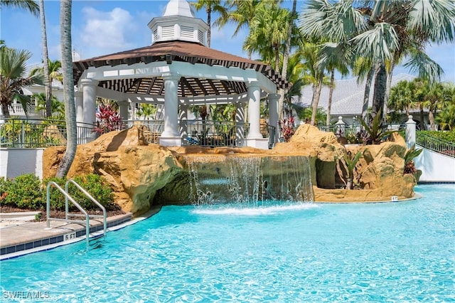 4610 Hawks Nest Dr Unit A104, Naples, FL 34114 - view of swimming pool with a gazebo