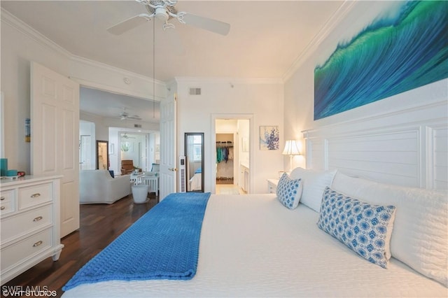 4610 Hawks Nest Dr Unit A104, Naples, FL 34114 - bedroom featuring crown molding, dark wood-style flooring, ceiling fan, and ensuite bathroom