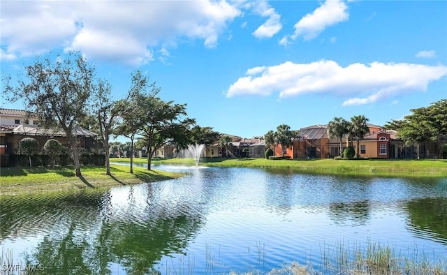 8565 Via Garibaldi Cir Unit 104, Estero, FL 33928 - water view featuring nearby suburban area