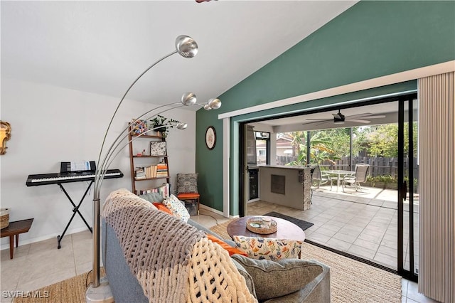 663 110th Ave N, Naples, FL 34108 - tiled living room with vaulted ceiling and a ceiling fan