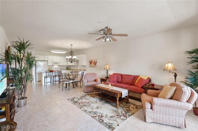 9631 Spanish Moss Way Unit 3923, Bonita Springs, FL 34135 - living room featuring a ceiling fan, light tile patterned floors, and a chandelier