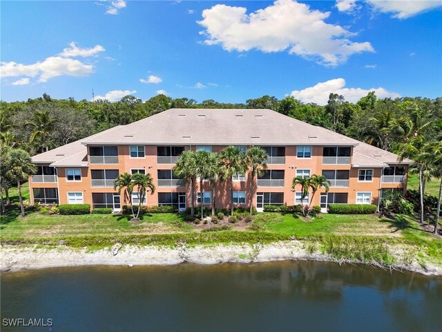 9631 Spanish Moss Way Unit 3923, Bonita Springs, FL 34135 - view of building exterior featuring a water view and view of scattered trees