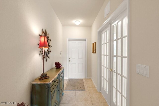 9631 Spanish Moss Way Unit 3923, Bonita Springs, FL 34135 - entryway featuring light tile patterned floors and baseboards
