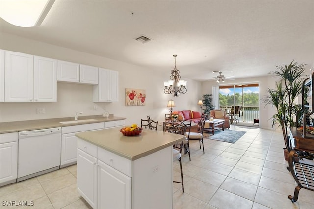 9631 Spanish Moss Way Unit 3923, Bonita Springs, FL 34135 - kitchen featuring dishwasher, a sink, light countertops, and light tile patterned flooring