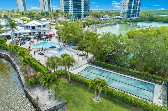 430 Cove Tower Dr Unit 501, Naples, FL 34110 - drone / aerial view of a pool area and a nearby body of water