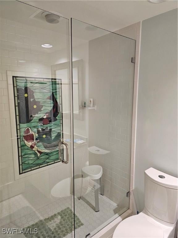430 Cove Tower Dr Unit 501, Naples, FL 34110 - full bathroom with toilet and a stall shower