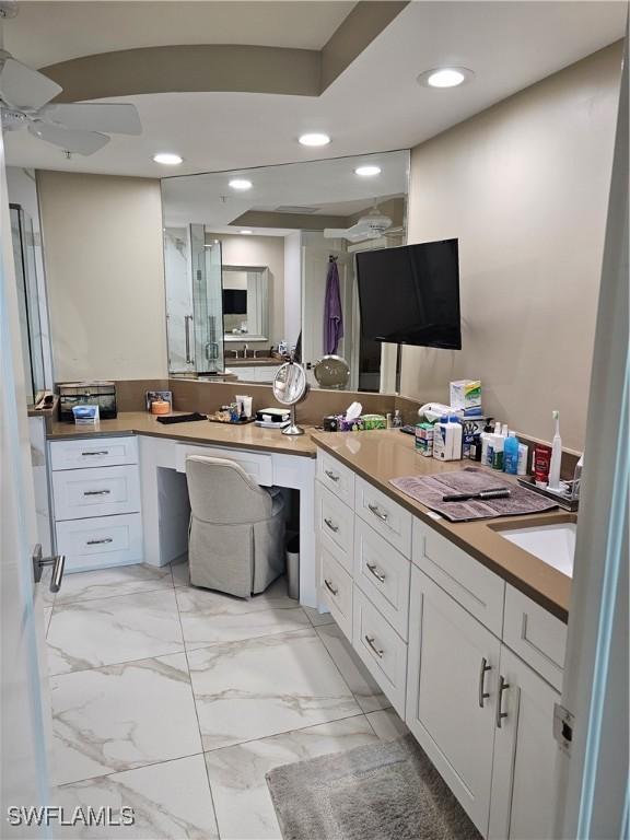 430 Cove Tower Dr Unit 501, Naples, FL 34110 - bathroom featuring vanity, recessed lighting, a ceiling fan, and marble finish flooring