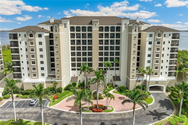 11600 Court Of Palms Unit 201, Fort Myers, FL 33908 - view of apartment building / complex with a water view