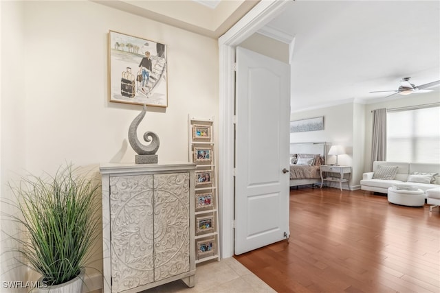 11600 Court Of Palms Unit 201, Fort Myers, FL 33908 - hallway featuring wood finished floors and crown molding