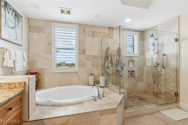 11600 Court Of Palms Unit 201, Fort Myers, FL 33908 - full bathroom with vanity, a bath, a shower stall, and tile patterned flooring