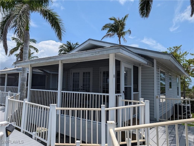11250 Porpoise Point Rd Unit 8, Matlacha, FL 33993 - view of side of property with a sunroom