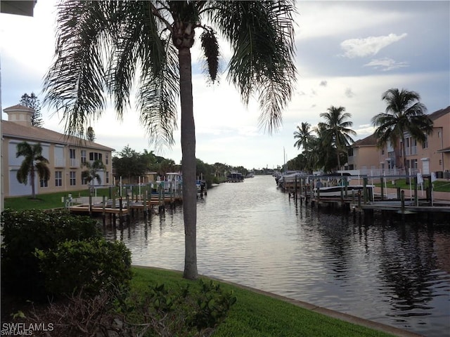 5116 Coronado Pkwy Unit 16, Cape Coral, FL 33904 - dock featuring a water view