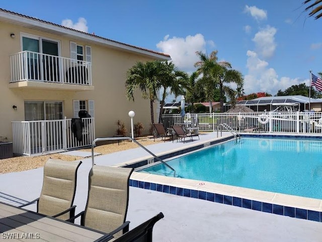 5116 Coronado Pkwy Unit 16, Cape Coral, FL 33904 - community pool featuring a patio area