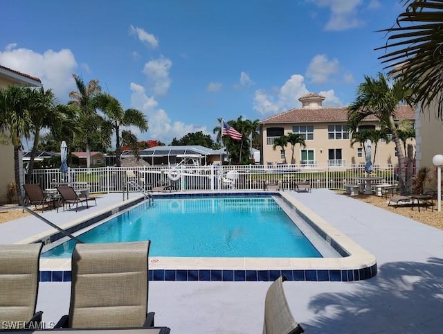 5116 Coronado Pkwy Unit 16, Cape Coral, FL 33904 - community pool featuring a patio area