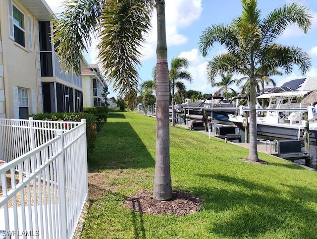 5116 Coronado Pkwy Unit 16, Cape Coral, FL 33904 - dock featuring boat lift