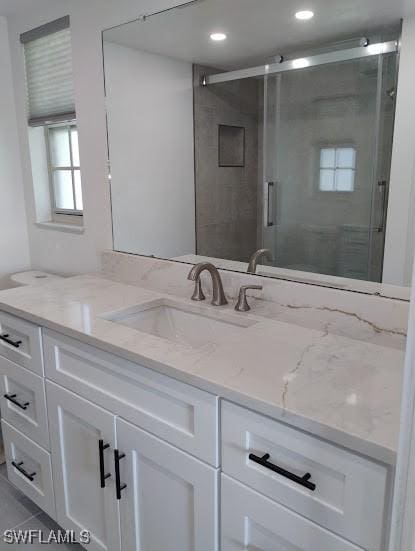 5116 Coronado Pkwy Unit 16, Cape Coral, FL 33904 - full bath with vanity, a stall shower, and recessed lighting