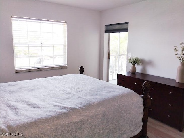 5116 Coronado Pkwy Unit 16, Cape Coral, FL 33904 - bedroom with wood finished floors