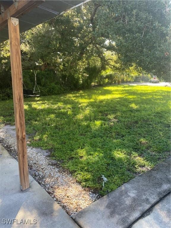 1516 Tropic Ter Unit 1516, North Fort Myers, FL 33903 - view of green lawn
