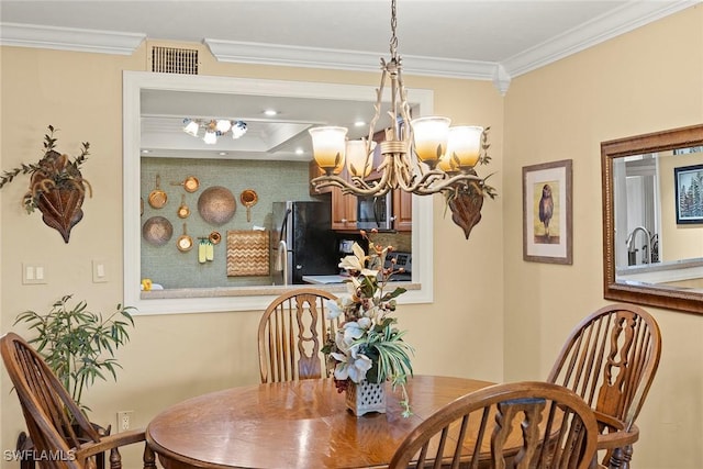 8411 Charter Club Cir Unit 1, Fort Myers, FL 33919 - dining area featuring crown molding and a chandelier