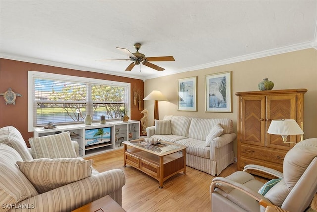 8411 Charter Club Cir Unit 1, Fort Myers, FL 33919 - living room featuring crown molding, a ceiling fan, and light wood-style floors