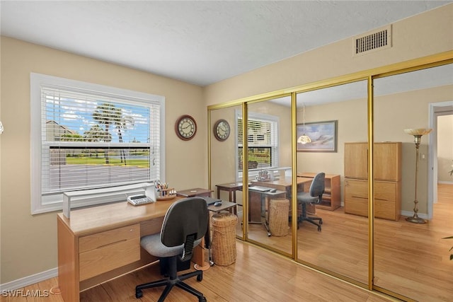 8411 Charter Club Cir Unit 1, Fort Myers, FL 33919 - office space featuring light wood-style floors and baseboards
